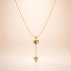 Aarvika 22K Gold-Plated Double Heart Drop Pendant Necklace – model wearing