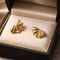 Aarvika Gold Abstract Shell Studs – front view