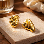 Aarvika Gold Wave Stud Earrings – close-up detail