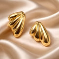 Aarvika Gold Wave Stud Earrings – front view