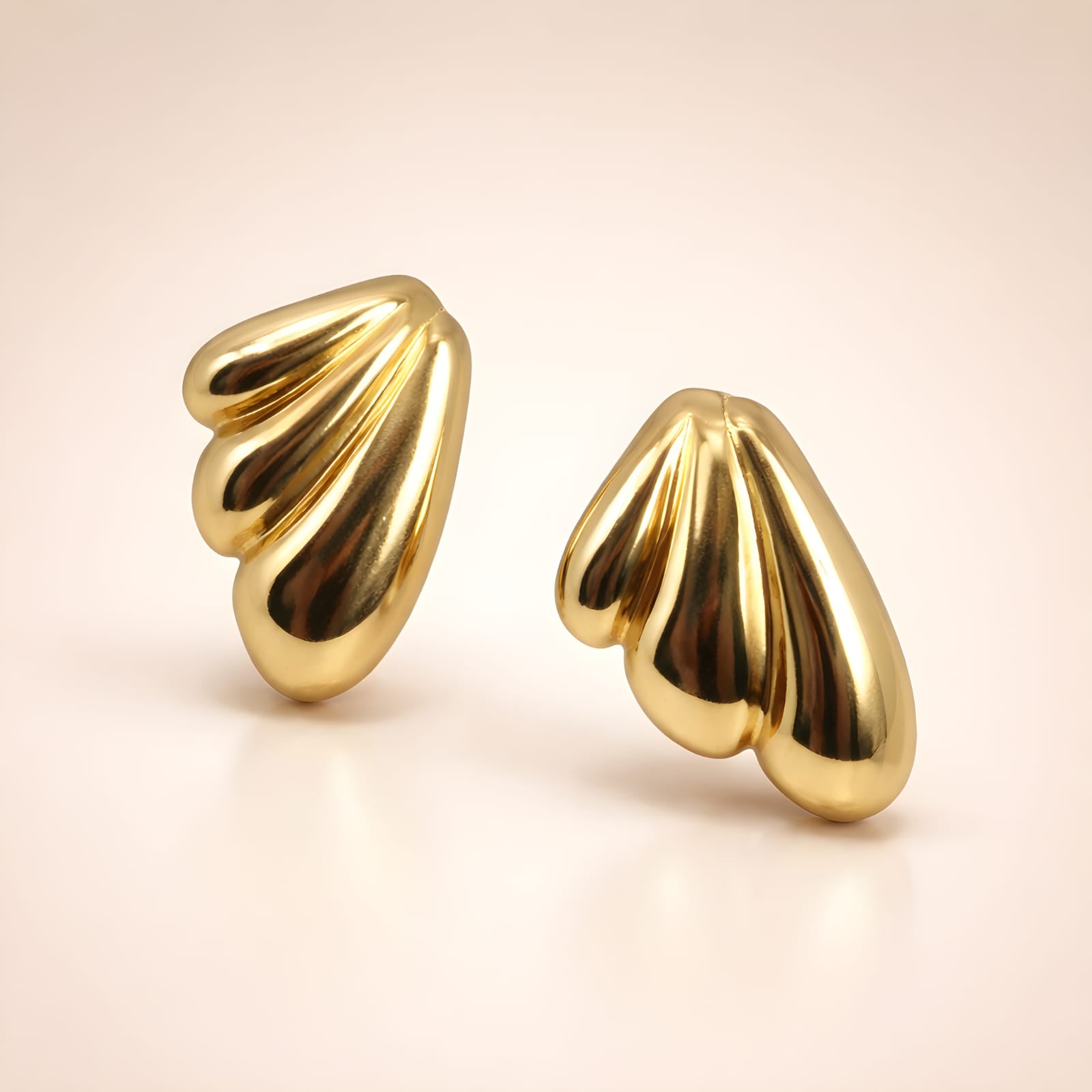 Aarvika Gold Wave Stud Earrings – back view