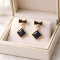 Aarvika Black Geometric Drop Earrings – front view