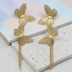 Aarvika Golden Butterfly Tassel Drops – model wearing
