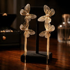 Aarvika Golden Butterfly Tassel Drops – side view