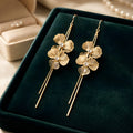 Aarvika Golden Floral Long Drops – front view