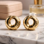 Aarvika Textured Gold Huggie Hoops – front view