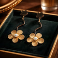Aarvika Golden Floral Wave Drop Earrings – front view