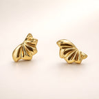 Aarvika Gold Abstract Shell Studs – model wearing