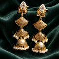 Aarvika Pearl Traditional Cow Motif Jhumka Earrings – front view