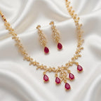 Aarvika American Diamond Premium Ruby Red AD Necklace Set – flat lay