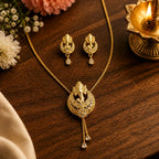 Aarvika Divine Ganesha Pendant Necklace Set - Gold-Plated Pendant with Matching Earrings
