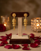 Aarvika Traditional Gold-Tone Layered Tassel Jhumka Earrings
