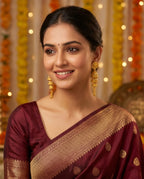 Aarvika Traditional Gold-Tone Layered Tassel Jhumka Earrings