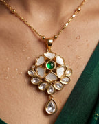 Aarvika Emerald Stone 18K Gold-Plated Emerald Floral Pendant Set with Ethnic – close-up detail