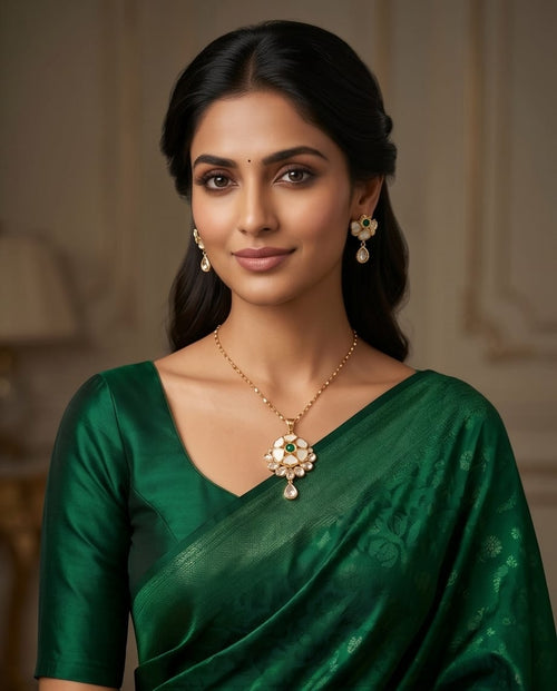 Aarvika Emerald Stone 18K Gold-Plated Emerald Floral Pendant Set with Ethnic – side view