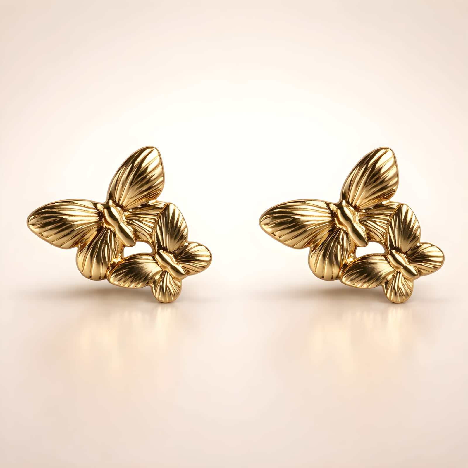 Aarvika Golden Butterfly Studs – side view