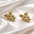 Aarvika Golden Butterfly Studs – front view