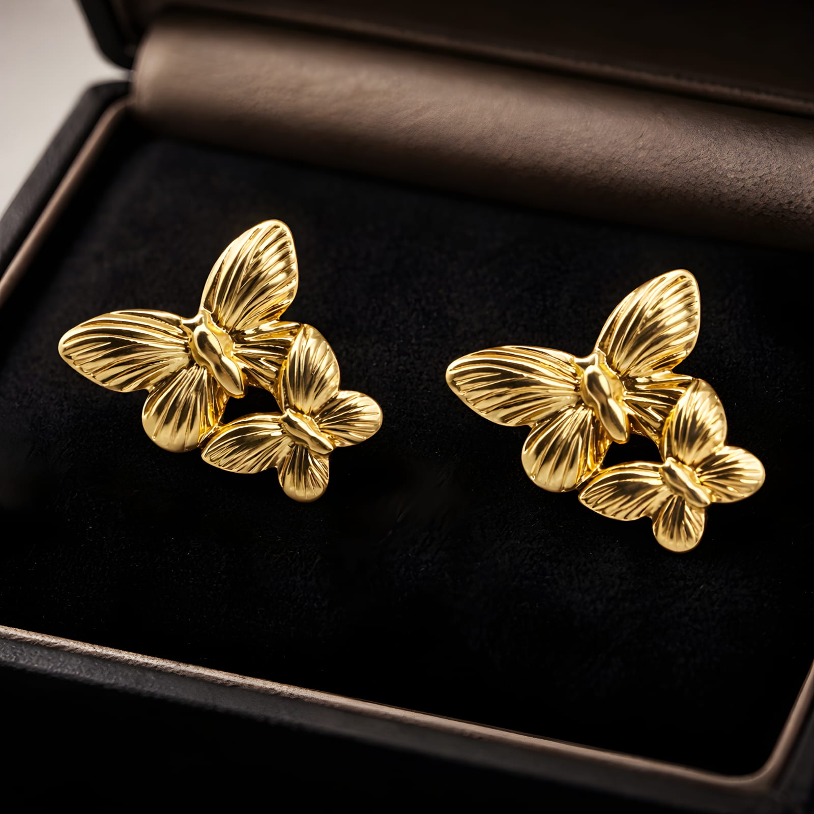 Aarvika Golden Butterfly Studs – model wearing
