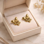 Aarvika Golden Butterfly Studs – flat lay