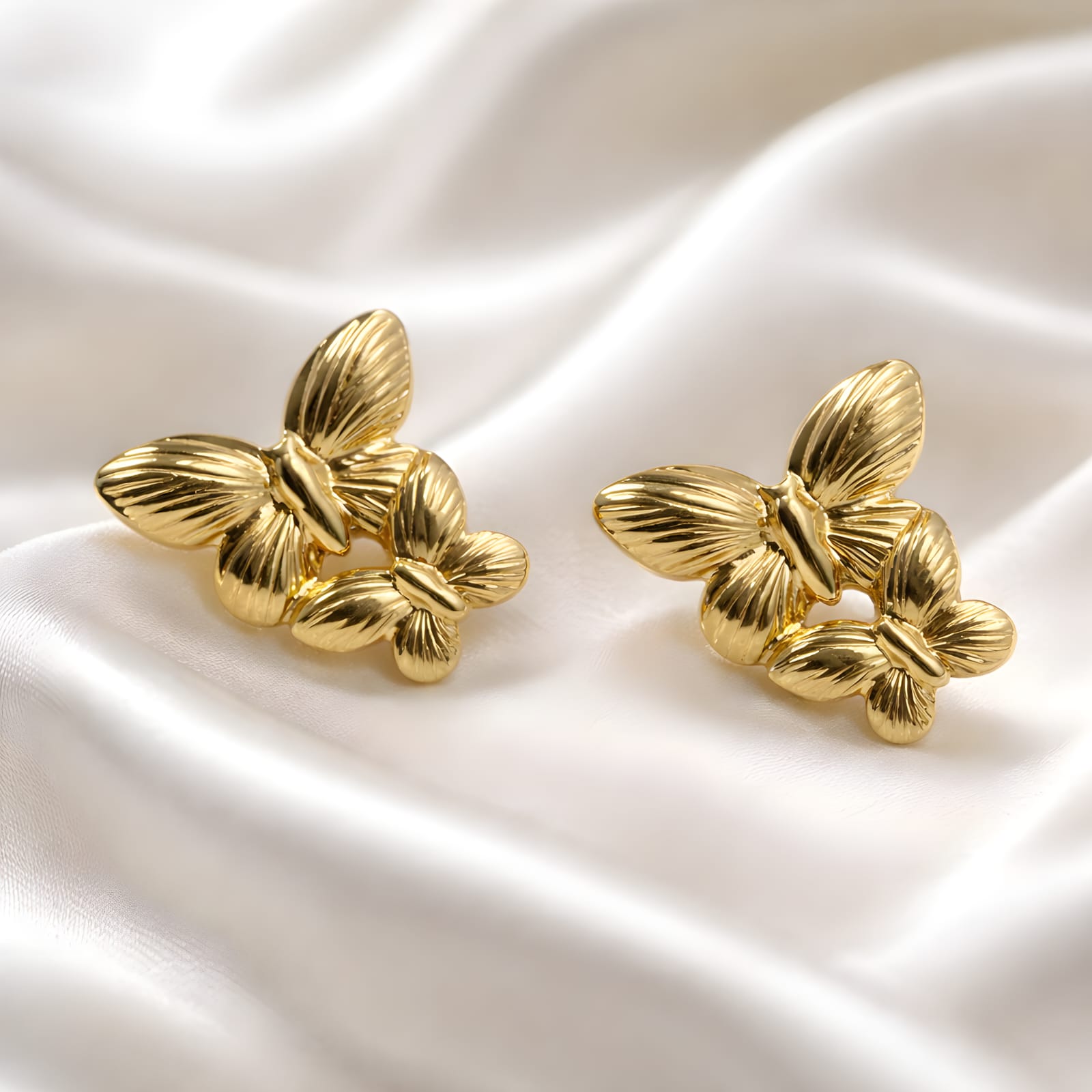 Aarvika Golden Butterfly Studs – back view